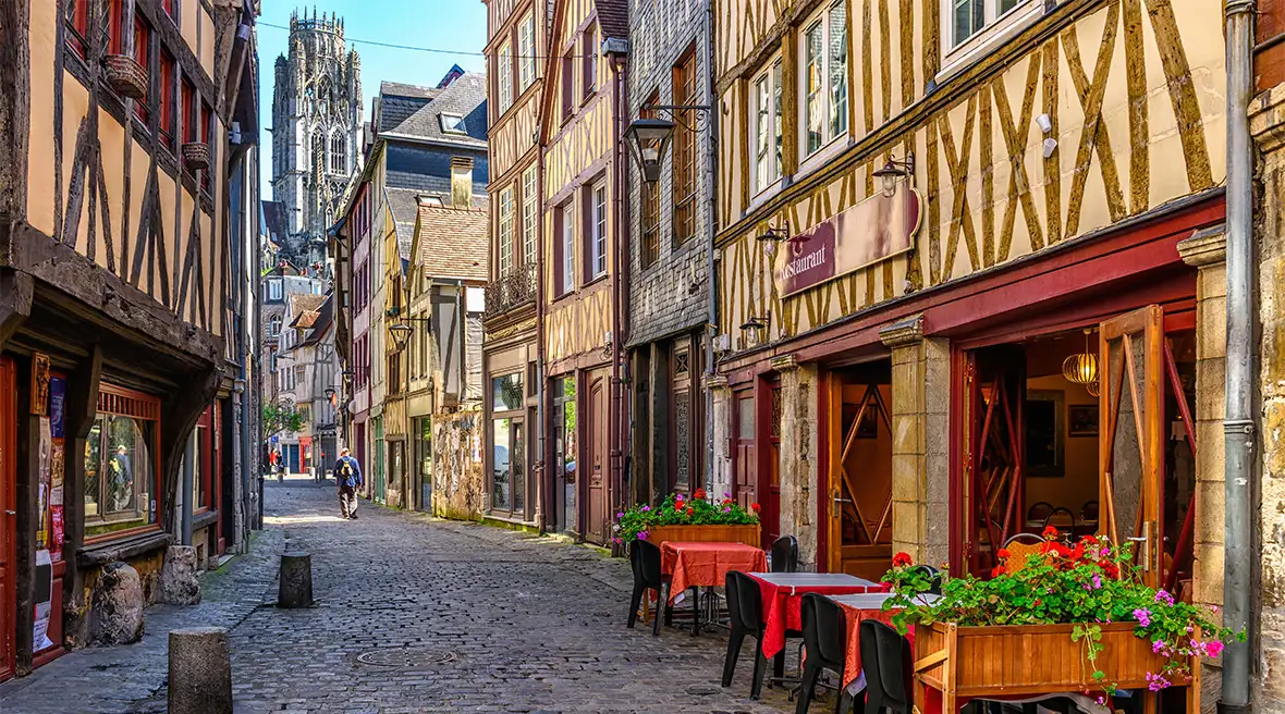 Historic half-timbered houses and a cobbled street in Rouen
